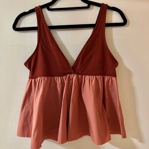 Multi-texture peplum tank top